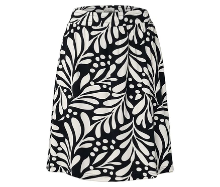 Gros plan d'une jupe avec une taille élastique et un motif floral noir et blanc.
