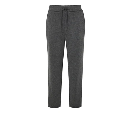 Pantalon de survêtement gris avec cordon de serrage à la taille.