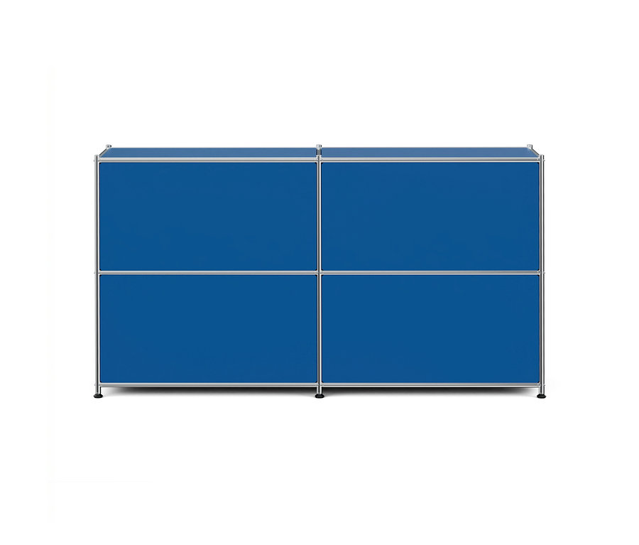 Meuble de rangement modulaire rectangulaire bleu avec quatre compartiments et un cadre argenté, reposant sur de petits pieds.