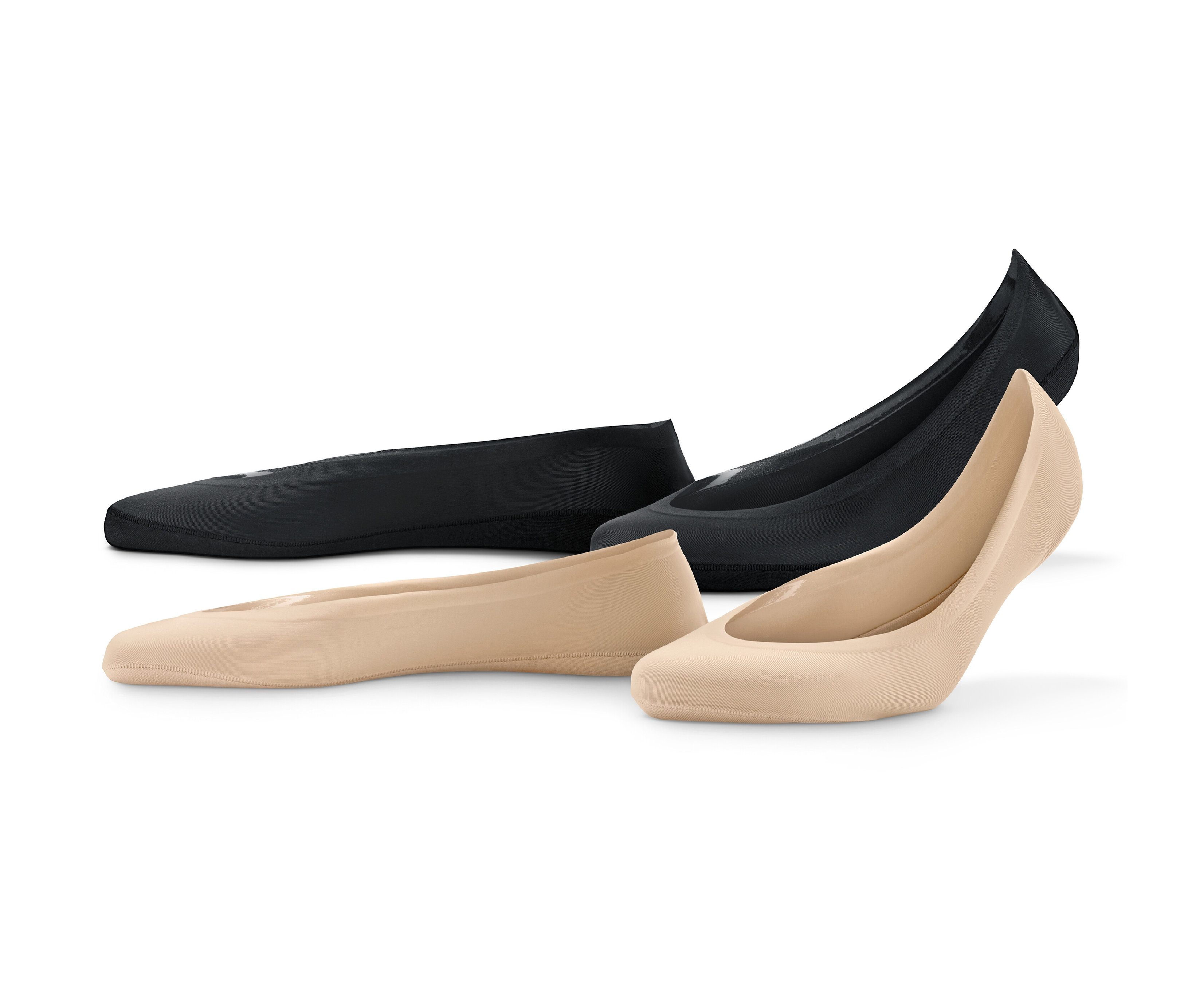 Deux paires de socquettes invisibles Magic Cut noires et deux paires beiges.