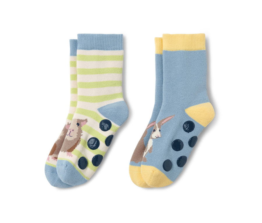 Deux paires de chaussettes antidérapantes pour tout-petit avec motif animalier.
