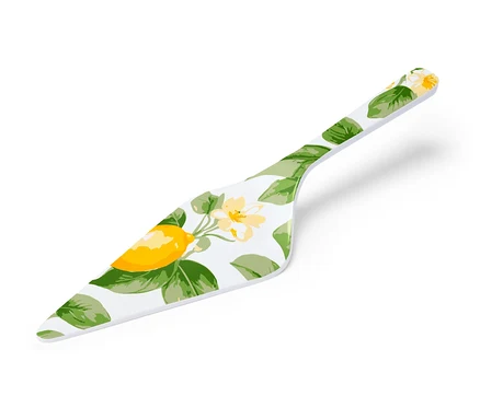 Pelle à tarte avec motif citron et feuilles.