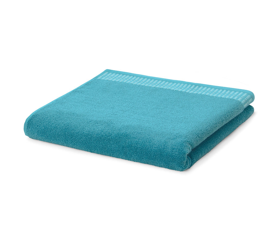 Drap de bain premium turquoise plié.