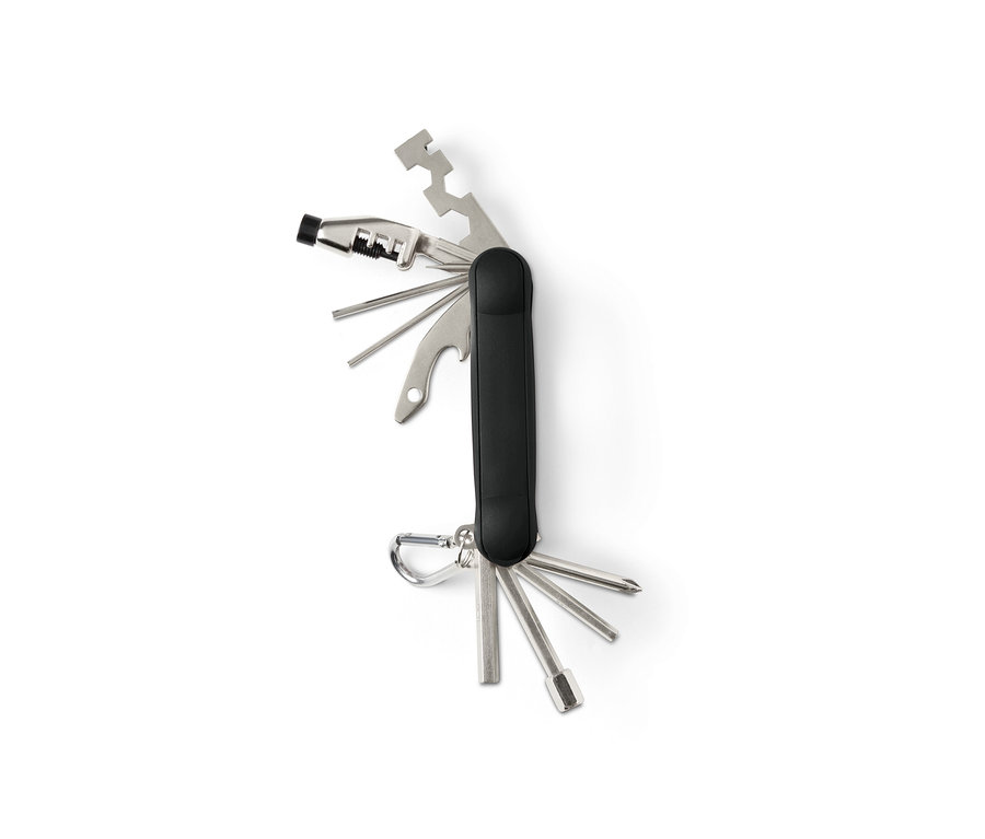 Outil multifonctionnel pour vélo déplié avec manche noir et outils argentés.
