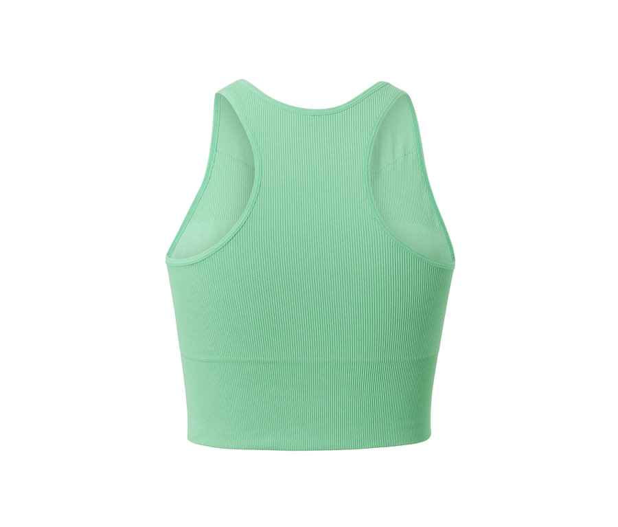 Détail d'une brassière de sport sans coutures verte.