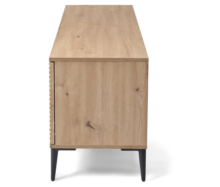 Vue latérale d'une commode en bois clair avec des pieds noirs.