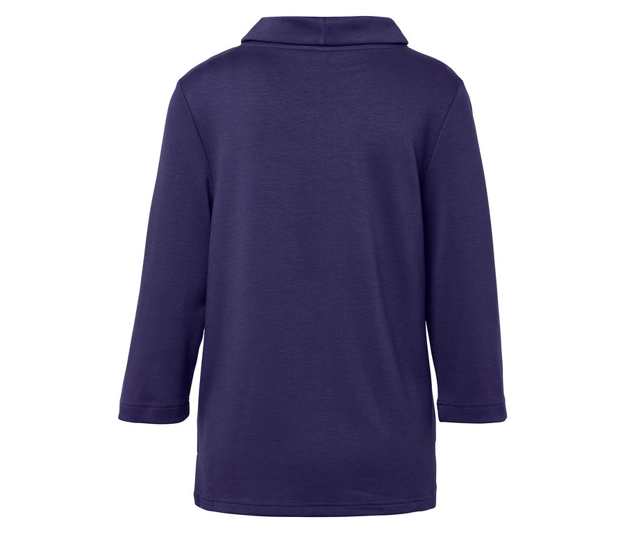 Vue arrière d'une tunique violette à col roulé et manches trois quarts.