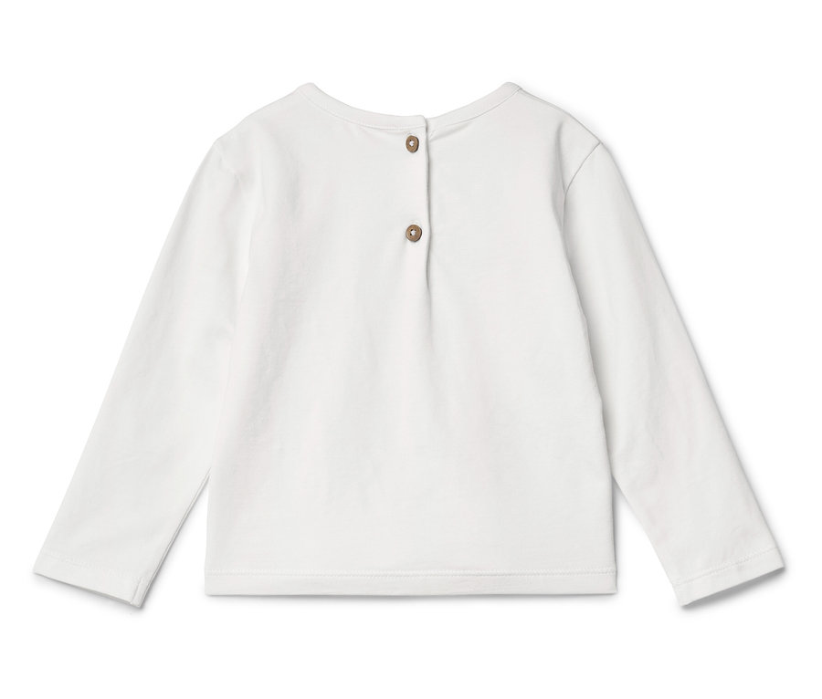 T-shirt blanc à manches longues avec deux boutons dans le dos.