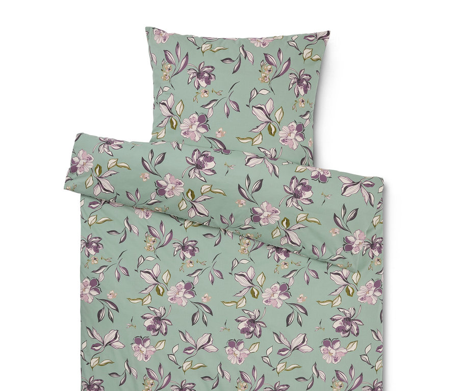 Ensemble de literie à motif floral violet et vert.