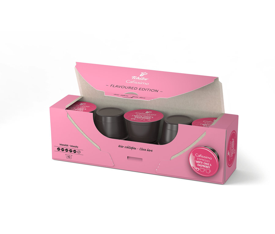 Boîte rose ouverte de Cafissimo Flavoured Espresso – White Choc & Raspberry avec dix capsules à l'intérieur.