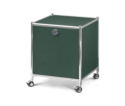 Un meuble de rangement cubique vert foncé sur roulettes, avec une porte, une poignée ronde et un cadre chromé.