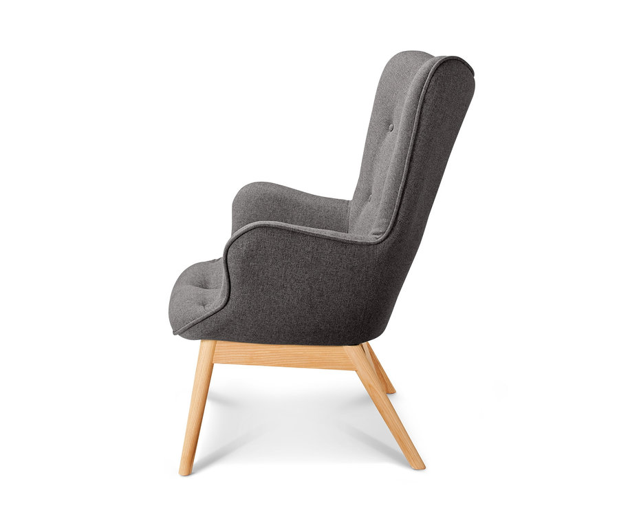 Vue latérale d'un fauteuil individuel gris foncé avec repose-pieds.