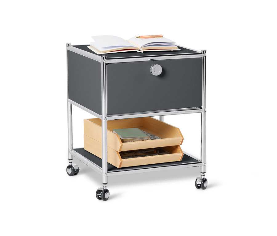 Table d'appoint grise en métal avec tiroir « CN3 ». Un carnet ouvert et un stylo sont posés sur le dessus.