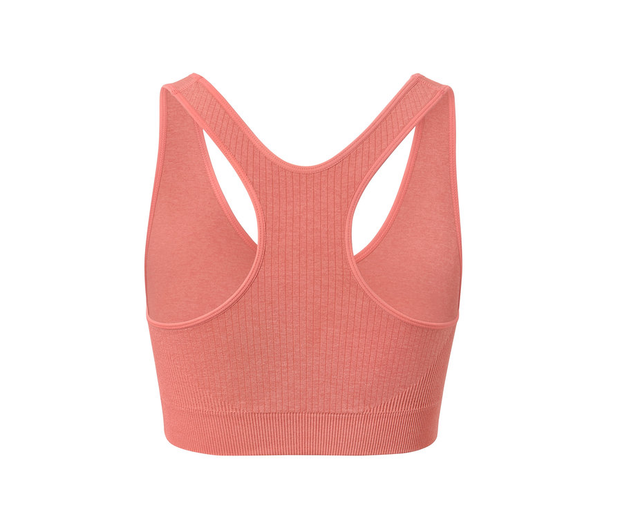 Détail vu de dos d'une brassière de sport sans coutures, vieux rose.