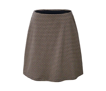 Gros plan d'une jupe en sweat à motif jacquard pied-de-poule.