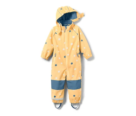Combinaison softshell jaune pour enfant avec un imprimé intégral à pois.