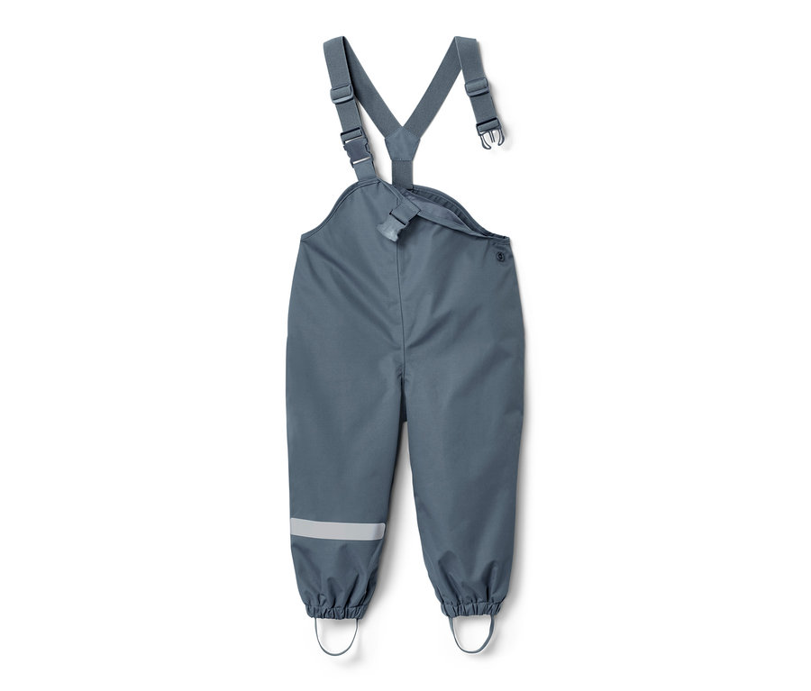 Pantalon imperméable bleu pour tout-petit avec bretelles et bande réfléchissante sur la jambe.