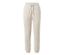 Pantalon de survêtement beige avec cordon de serrage à la taille.