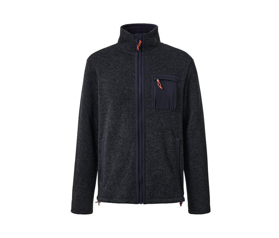 Une jaquette en polaire tricotée thermique bleu marine avec fermeture éclair et poche poitrine.