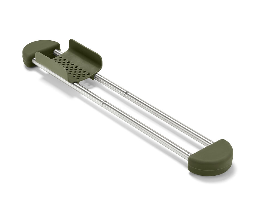 Support de rangement amovible pour évier vert olive avec des barres métalliques.