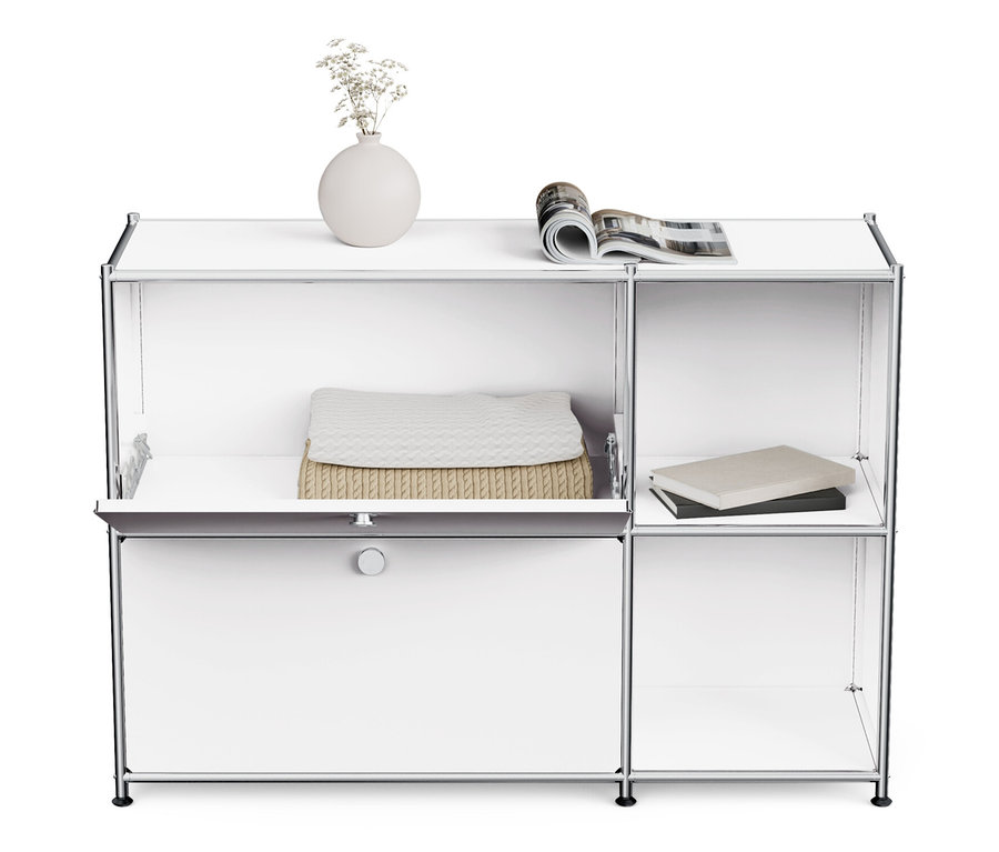 Buffet en métal blanc « CN3 » à 2 abattants avec un vase de fleurs et un magazine sur le dessus.