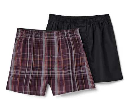 Deux boxers tissés, un à carreaux et un noir.