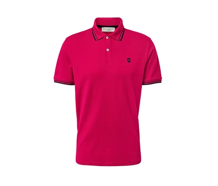 Polo rose en tissu piqué.