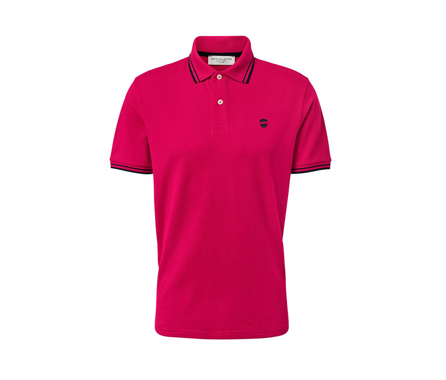Polo rose en tissu piqué.