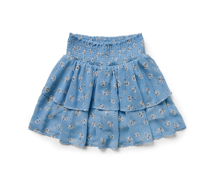 Jupe étagée bleue pour enfant avec motif floral blanc.