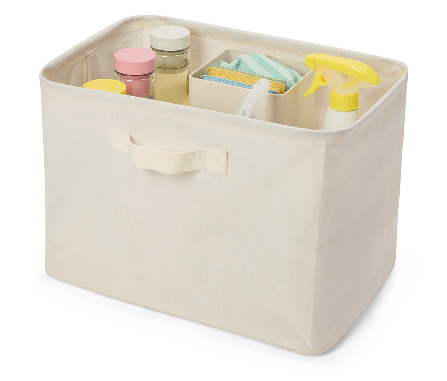 Une boîte de rangement pliable haute, de couleur crème, remplie de produits de nettoyage.