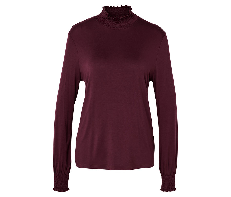 Haut bordeaux à manches longues avec col montant à volants.