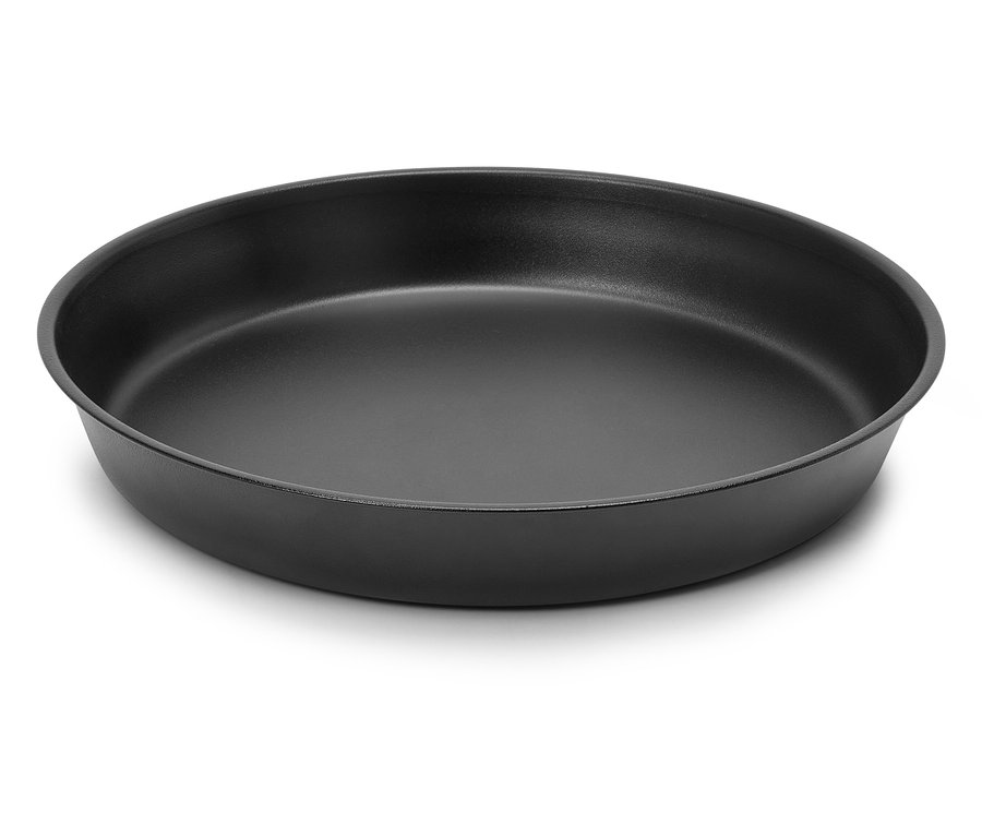 Moule à pâtisserie rond noir sur fond blanc.