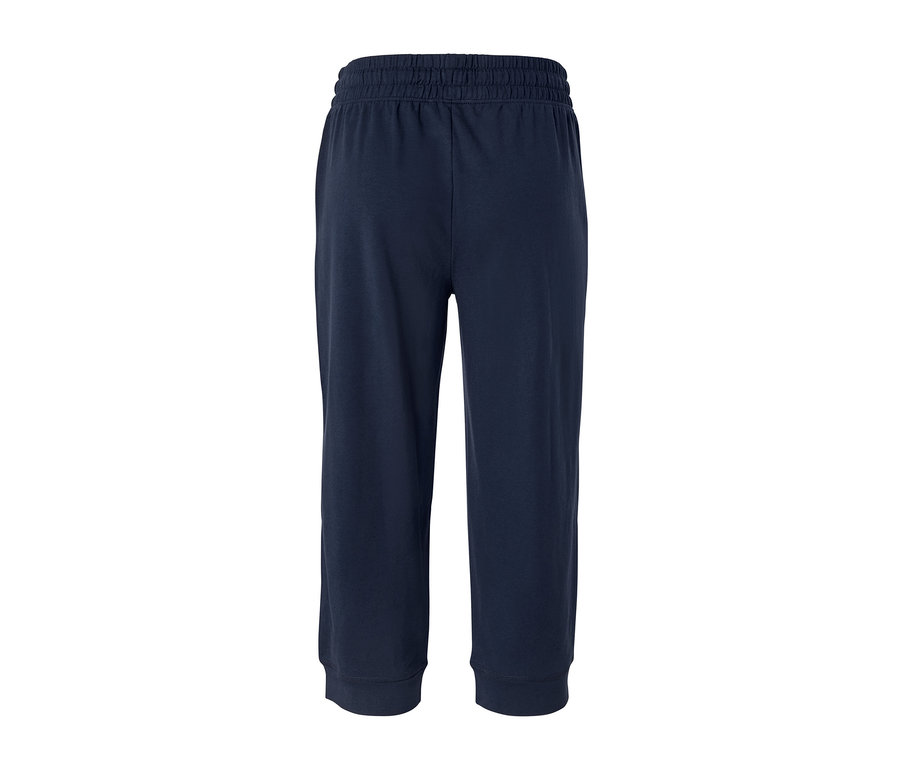 Pantalon de survêtement 3/4 bleu foncé.