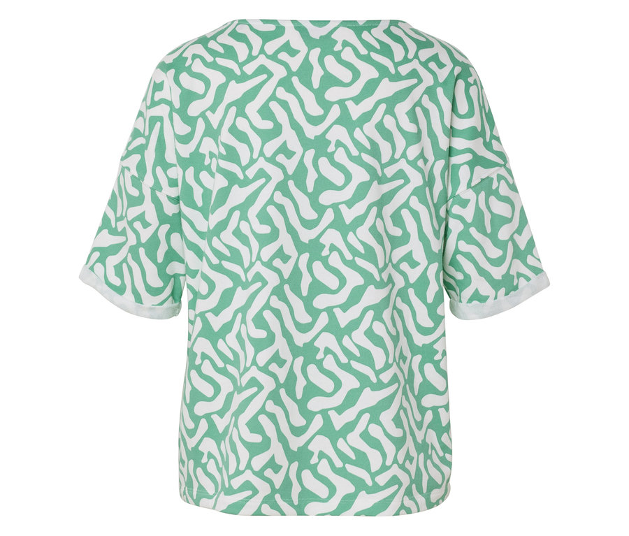 T-shirt à motifs verts et blancs vu de dos.