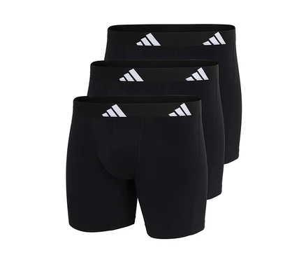 Trois boxers adidas Active Flex en coton noirs, empilés, avec le logo adidas blanc sur la ceinture.