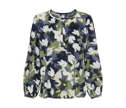 Blouse à manches longues avec un motif floral abstrait dans des tons de vert, bleu, blanc et bleu foncé. Elle présente un col rond avec une courte patte de boutonnage.