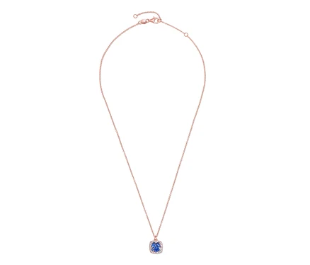 Collier avec chaîne en or rose et pendentif bleu.