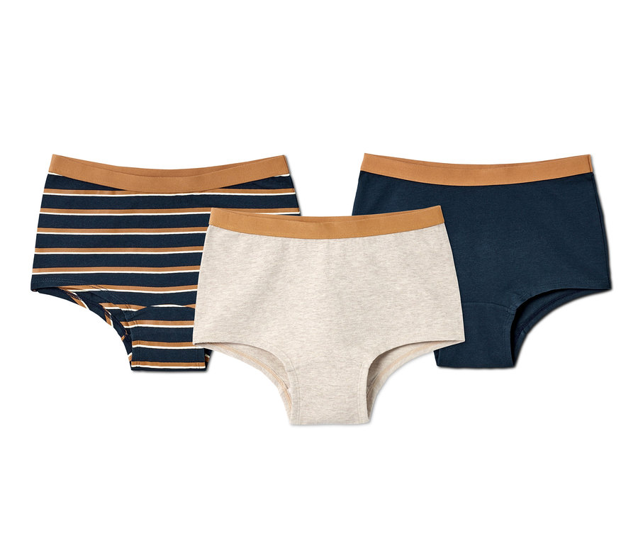 Trois culottes pour enfants : une à rayures, une grise et une bleu marine. 3 culottes pour enfants.