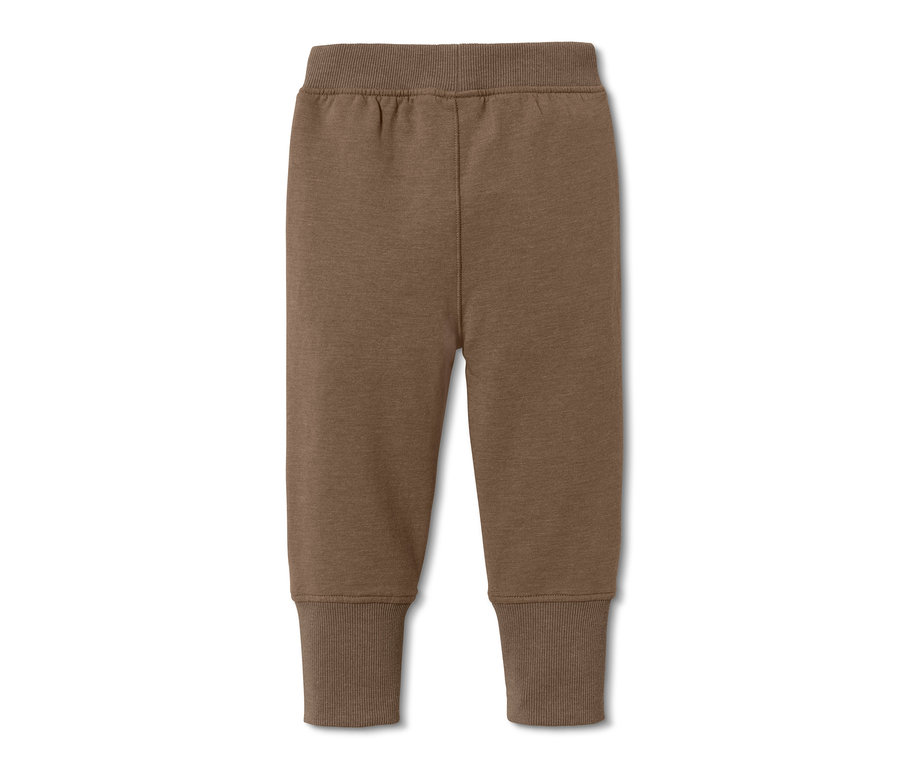 2 pantalons molletonnés marron.