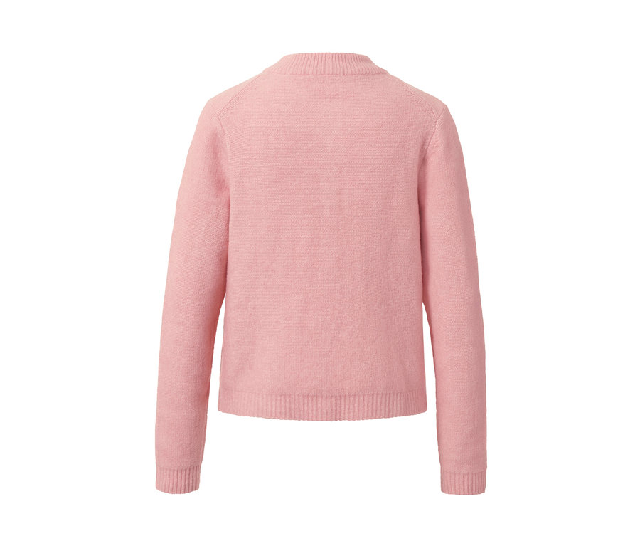 Cardigan en maille rose avec de la laine.