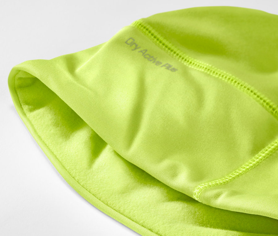 Détail d'un bonnet technique thermique, vert fluo.