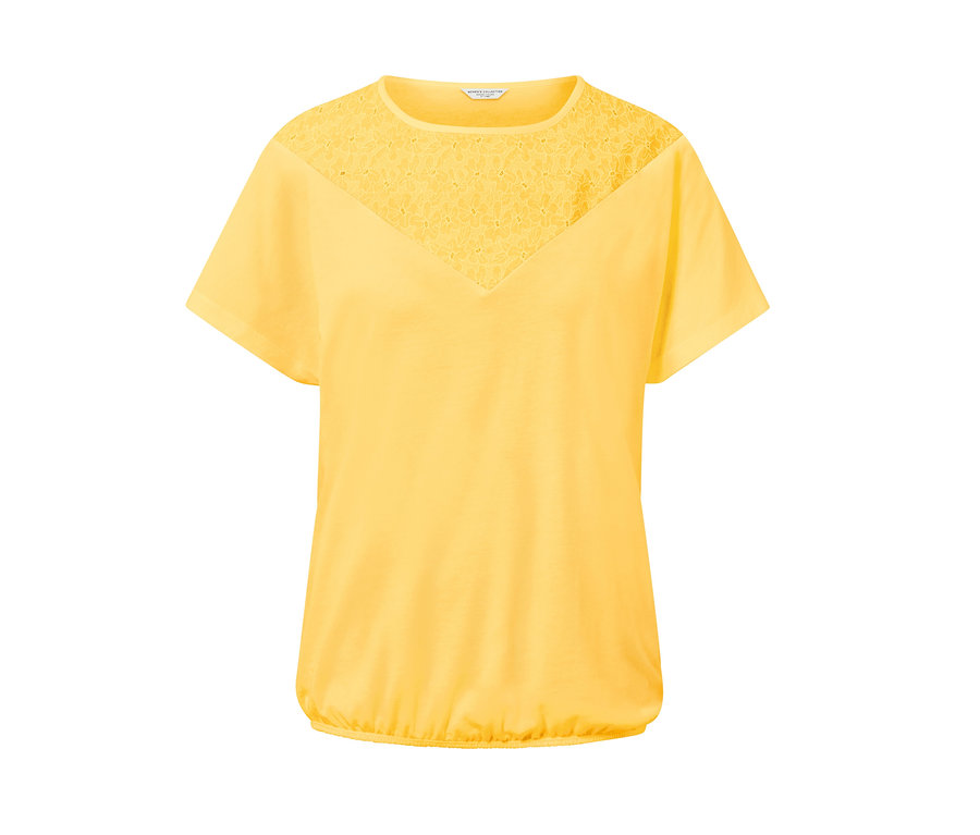 Blouse à broderie jaune.