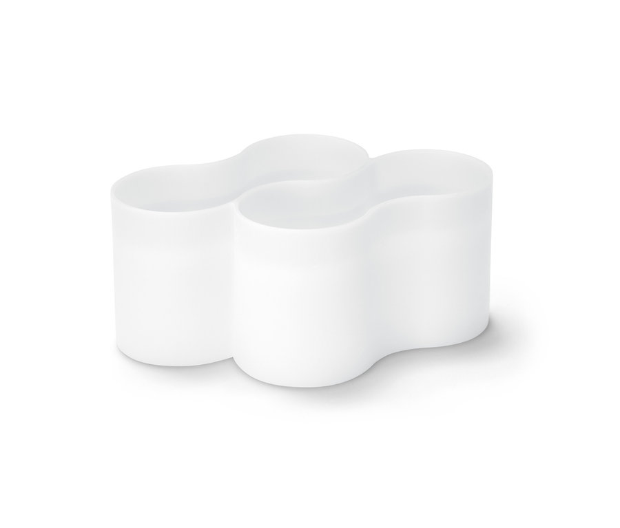 Porte-tubes blanc à trois compartiments.