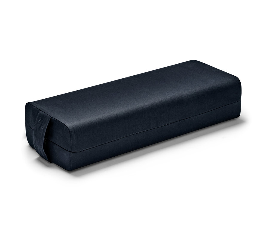 Un bolster de yoga.