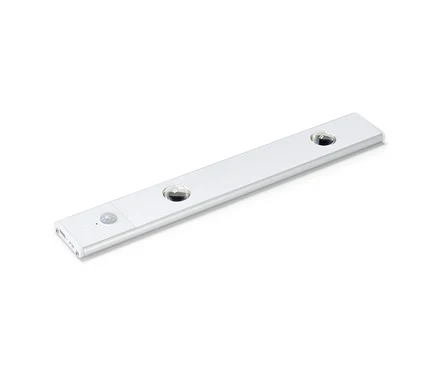 Une lampe multifonctions LED à batterie blanche posée sur un fond blanc.