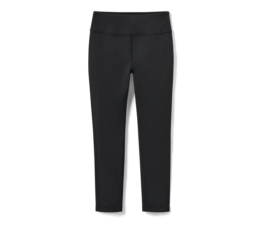 Un legging de sport noir pour enfants sur fond blanc.
