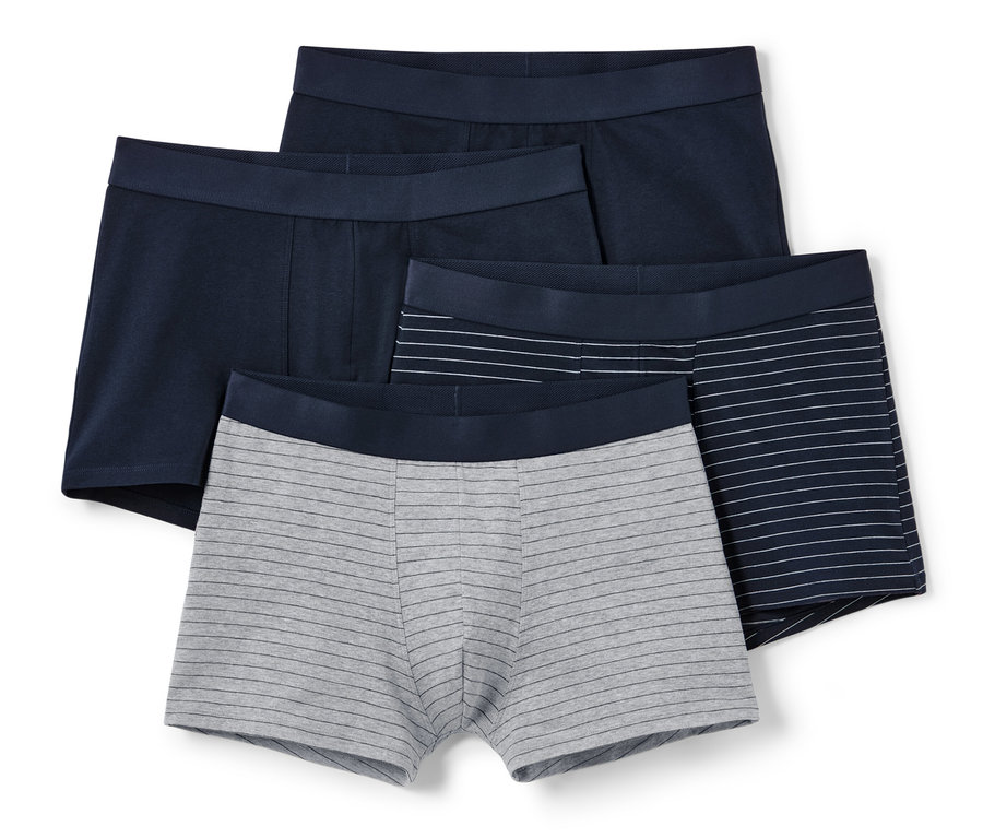 Quatre boxers : deux bleu marine, un gris rayé et un bleu marine avec des rayures blanches.