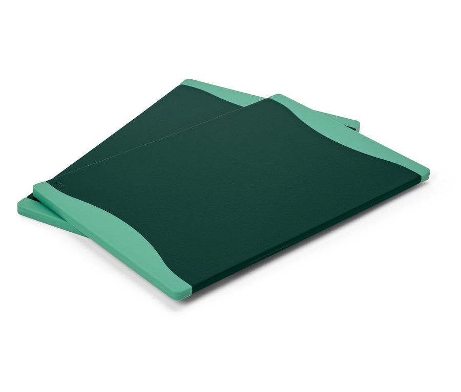 Deux planches à découper vertes sont posées l'une sur l'autre.