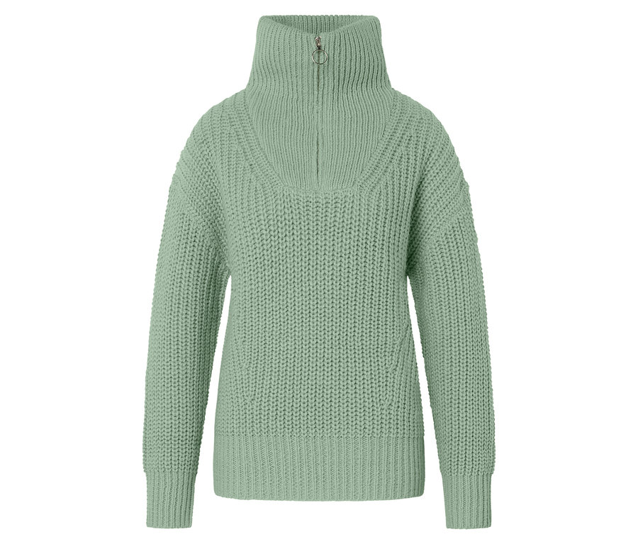 Un pull camionneur en grosse maille vert clair sur un fond blanc.