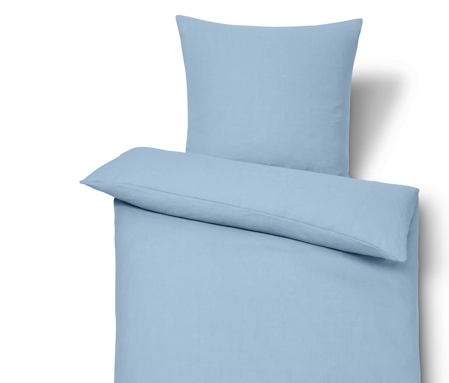 Linge de lit en lin bleu clair, taille standard.